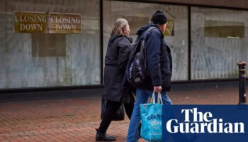 UK economy stagnates as GDP figures revised down