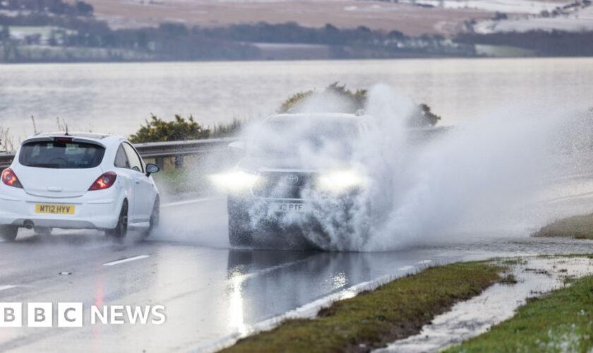 UK weather warnings dampen New Year celebrations