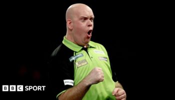 Michael van Gerwen shouts after winning a leg at the World Darts Championship