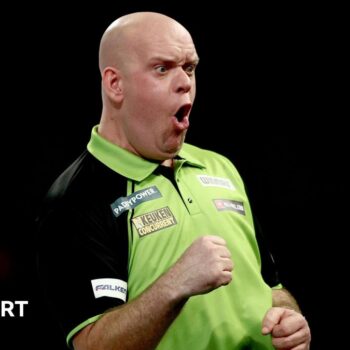 Michael van Gerwen shouts after winning a leg at the World Darts Championship