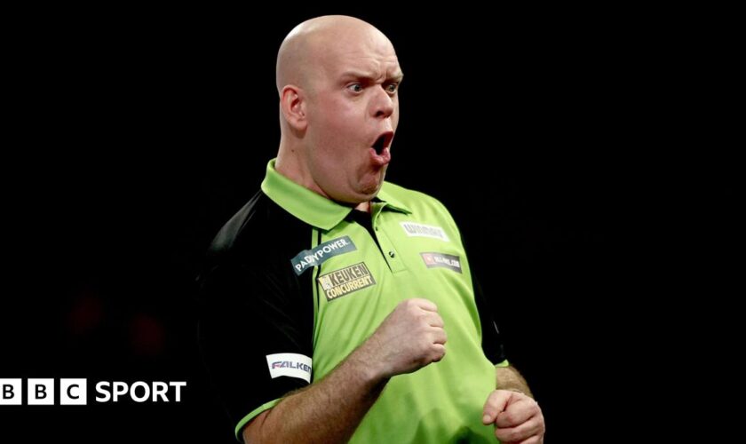 Michael van Gerwen shouts after winning a leg at the World Darts Championship