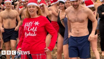 Watch: Hundreds run into sea at Boxing Day dips