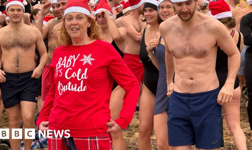 Watch: Hundreds run into sea at Boxing Day dips