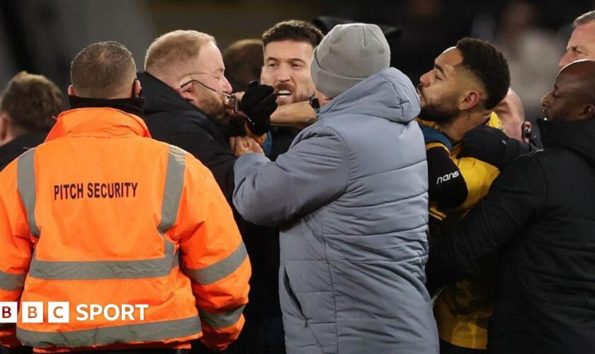 Matheus Cunhas appears to snatch a pair of glasses off the face of a member of Ipswich's security team