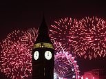 Hardy Brits ignore gale warnings and torrential downpours to see in the New Year in style - as traditional fireworks light up Big Ben in spite of storm fears that forced many displays to be axed