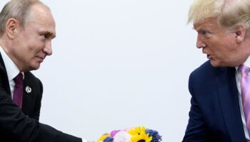 US President Donald Trump (R) attends a meeting with Russia's President Vladimir Putin during the G20 summit in Osaka on June 28, 2019.