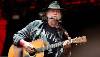 Canadian singer-songwriter Neil Young performs at the Orange Stage at the Roskilde Festival in Roskilde, Denmark, on July 1, 2016. Scanpix Denmark/Nils Meilvang/via REUTERS ATTENTION EDITORS - THIS IMAGE WAS PROVIDED BY A THIRD PARTY. FOR EDITORIAL USE ONLY. DENMARK OUT. NO COMMERCIAL SALES