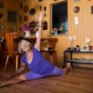 Agnes Keleti, a 91-year-old former Olympic gymnast, performs a split at her house in Herzliya, Israel, Monday, Aug. 13, 2012. Keleti won 10 Olympic medals, including 5 gold medals, while she represented Hungary in the Olympic games of 1948, 1952, and 1956. (AP Photo/Oded Balilty)