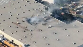 Plane crashes into huge warehouse with multiple 'casualties' reported