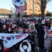 Supporters of impeached South Korean President Yoon Suk Yeol stage a rally to oppose a court having issued a warrant to detain Yoon, as police offices stand guard near the presidential residence in Seoul, South Korea, Friday, Jan. 3, 2025. The letters read "Oppose Impeachment." (AP Photo/Lee Jin-man)