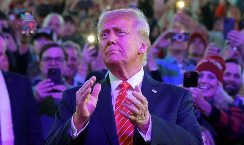 FILE PHOTO: U.S. President-elect Donald Trump arrives to attend a rally the day before he is scheduled to be inaugurated for a second term, in Washington, U.S., January 19, 2025. REUTERS/Carlos Barria/File Photo