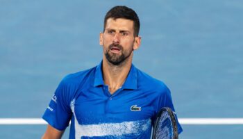 Jan 19, 2025; Melbourne, Victoria, Australia; Novak Djokovic of Serbia gestures during his match against Jiri Lehecka of Czech Republic in the fourth round of the men's singles at the 2025 Australian Open at Melbourne Park. Mandatory Credit: Mike Frey-Imagn Images