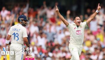 Scott Boland celebrates