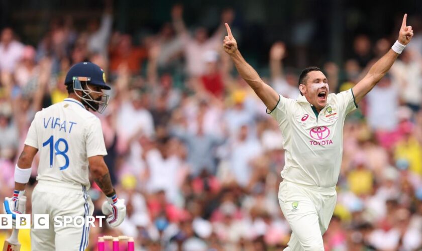 Scott Boland celebrates