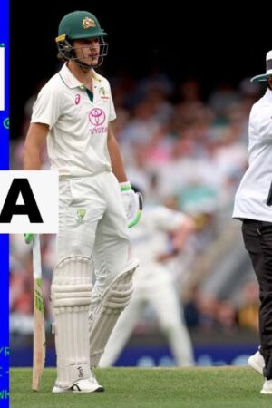 Australia's Sam Konstas & India's Jaspit Bumrah are separated by an umpire