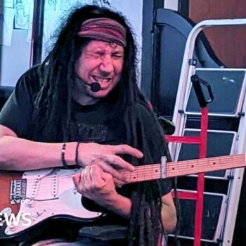 ‘I learned to play guitar with one arm after a stroke’