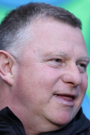 Mark Robins sitting in the dugout during his time as Coventry City boss